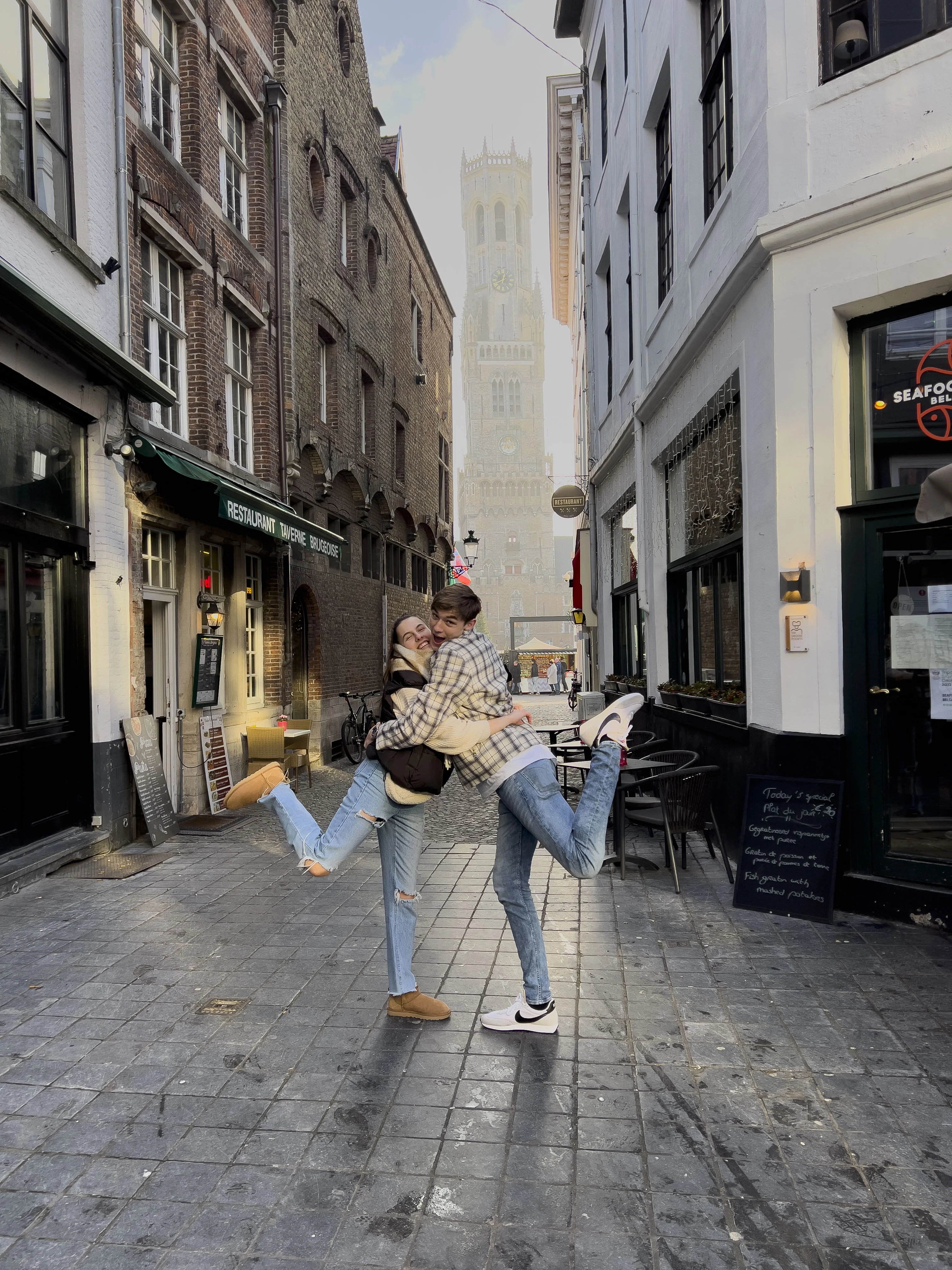 A winter moment in Bruges with historic buildings in the background
