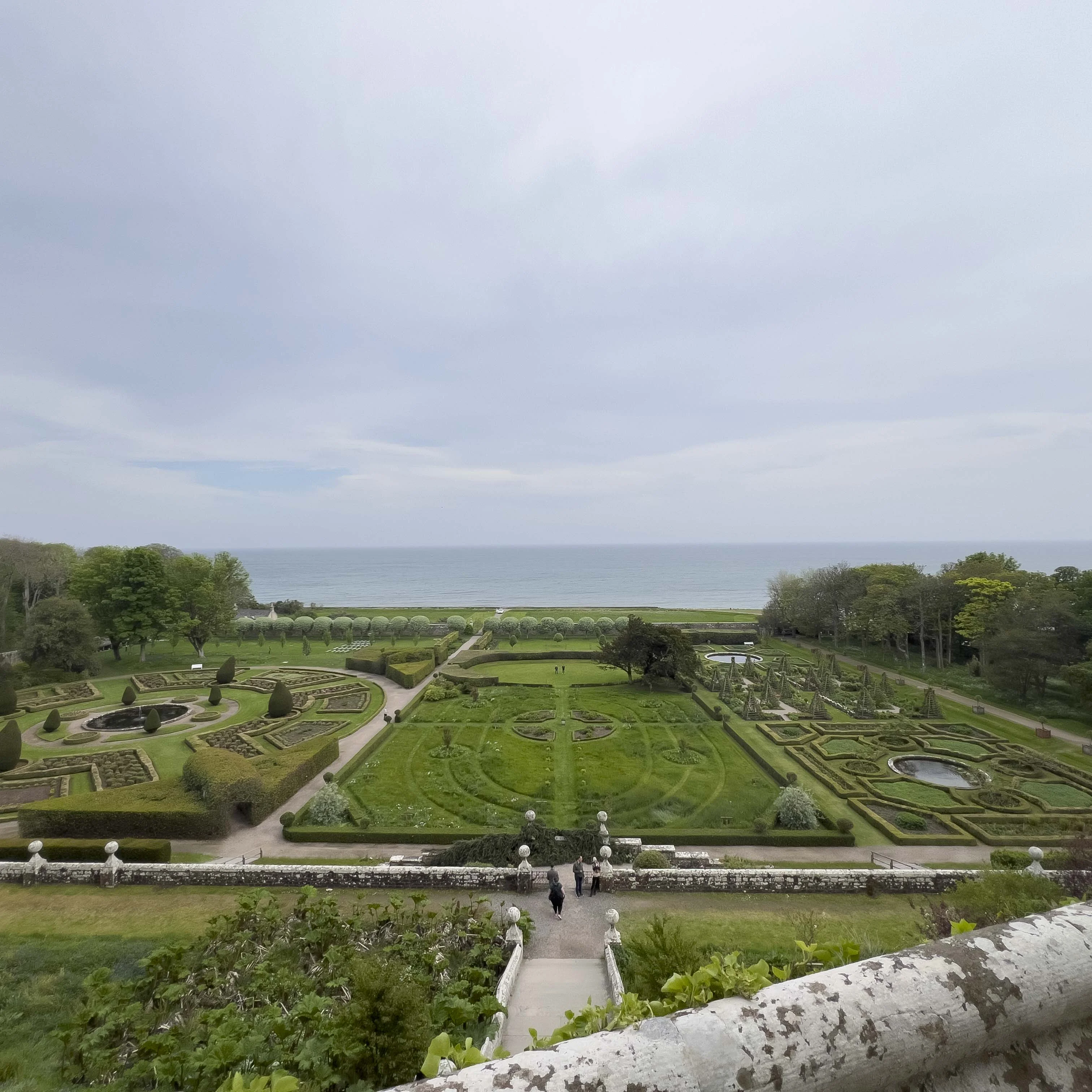 View of the Dunrobin Castle grounds with coastal sky